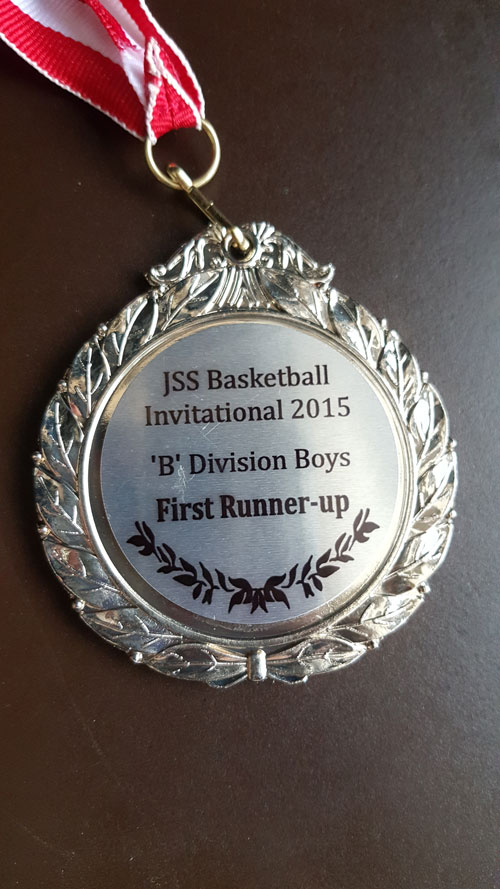 Picture of medal that states 'JSS Basketball Invitational 2015 B Division Boys First Runner-up